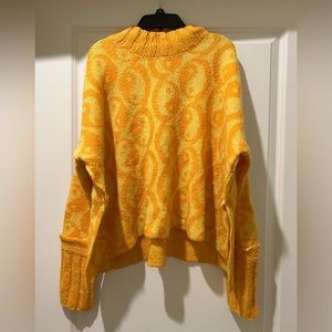 NWOT Free People sweater. Cozy, lightweight and comfortable.